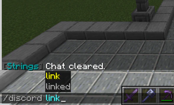 Minecraft chat autocomplete showing the /discord link command.