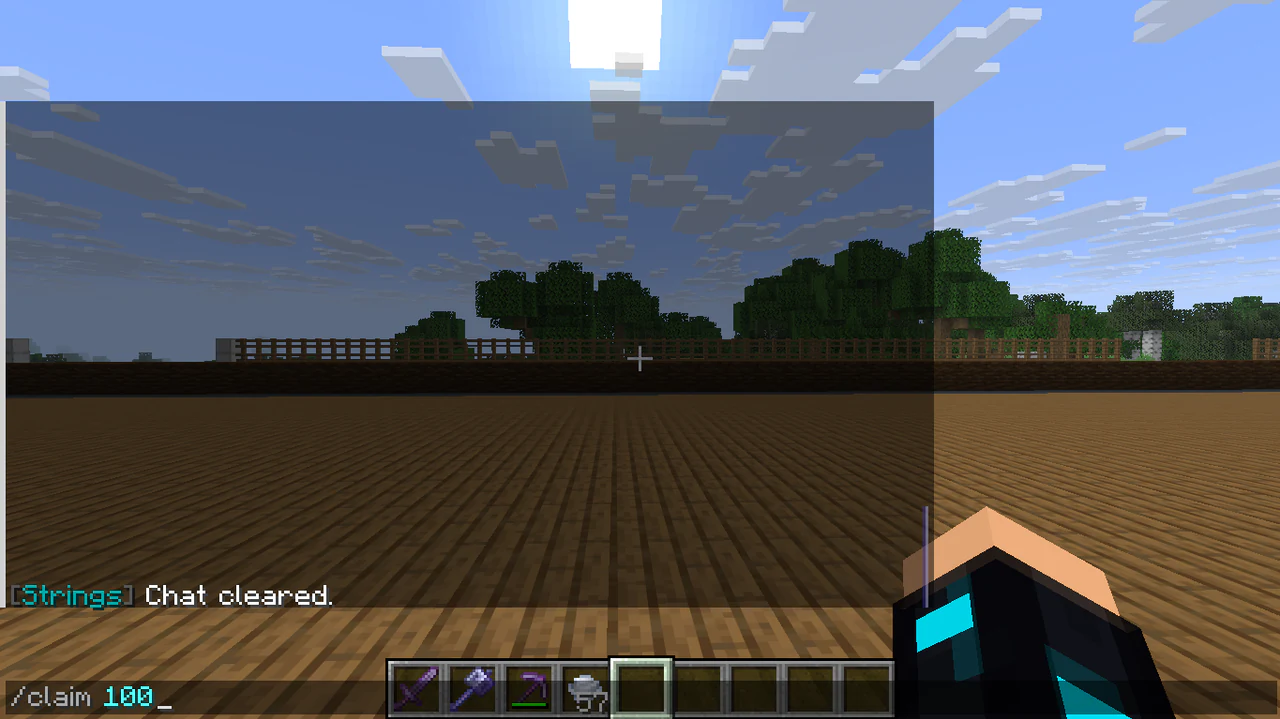 Minecraft chat showing the /claim 100 radius command