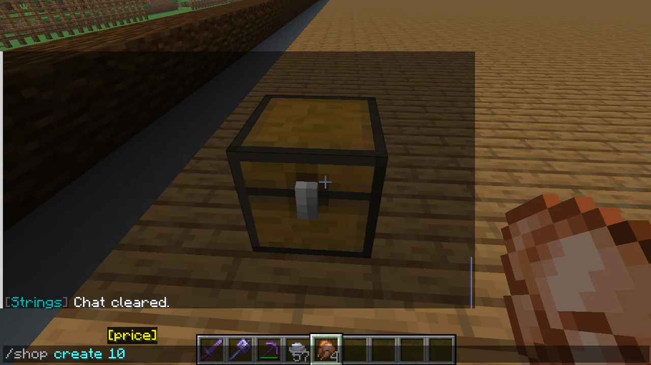 Minecraft chat showing /shop create 10 while aiming at a chest